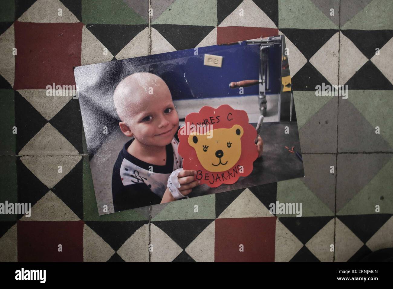 An old photo of Andres is seen at his house in Bogota, Colombia, on Feb. 3, 2017. Andres, 10, was diagnosed as Hodgkin s lymphoma five years ago and has received treatments like radiotherapies and chemotherapies since then. Thanks to various foundations which support families with children in cancer, Andres receives psychological and economic support through sponsorship programs. The World Cancer Day is commemorated on Feb. 4. Jhon Paz) (gj) COLOMBIA-BOGOTA-WORLD CANCER DAY-FEATURE e Jhonpaz PUBLICATIONxNOTxINxCHN   to Old Photo of Andres IS Lakes AT His House in Bogota Colombia ON Feb 3 2017 Stock Photo