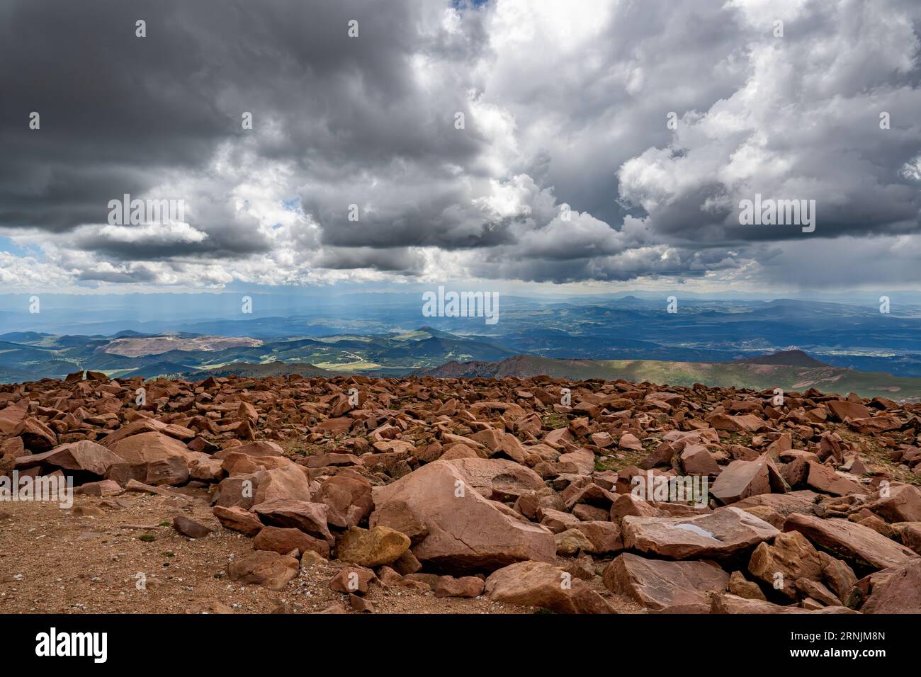 Pikes Peak Colorado Springs - summit view of clouds rocks and landscape / landscapes of Pike's Peak State Park Rocky Mountains USA in Summer Stock Photo
