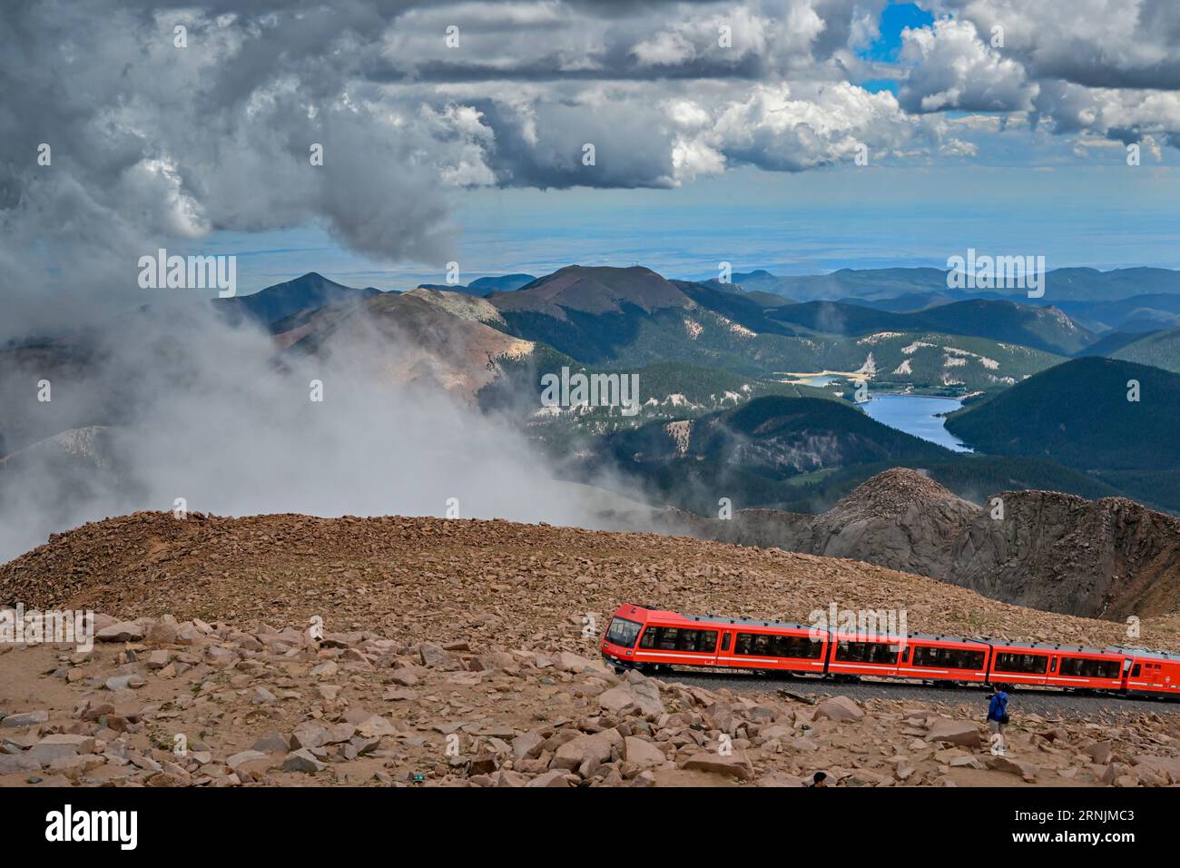Pikes Peak cog railway at summit - view of clouds rocks and landscape of Pike's Peak State Park Rocky Mountains Colorado Springs railroad in Summer Stock Photo