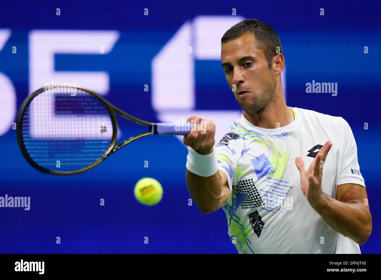 Laslo Djere, of Serbia, returns a shot to Novak Djokovic, of Serbia, during the third round of the U.S. Open tennis championships, Friday, Sept
