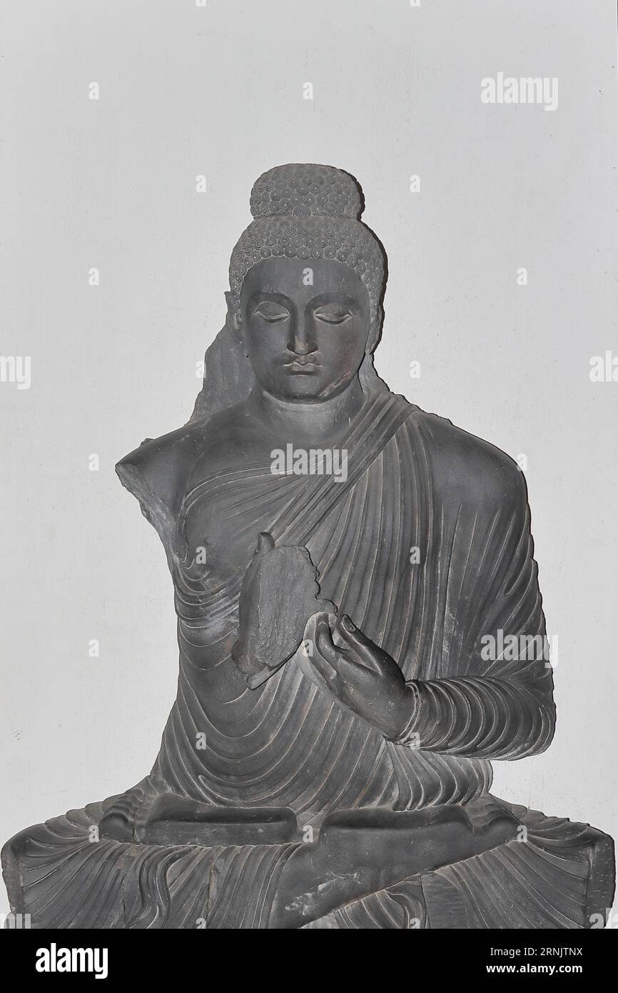 Kolkata, West Bengal, India - 29th August 2023: Ancient Gandhara style (Indo-Greco or Greco-Buddhist art) Lord Buddha statue at Kolkata Museum Stock Photo