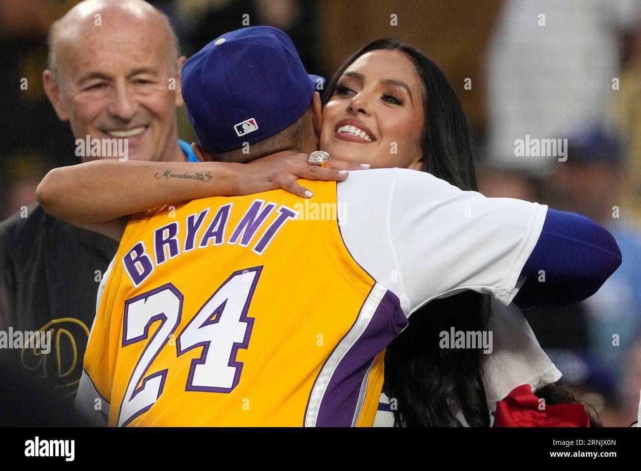 Vanessa Bryant, right, widow of Kobe Bryant, hugs Los Angeles