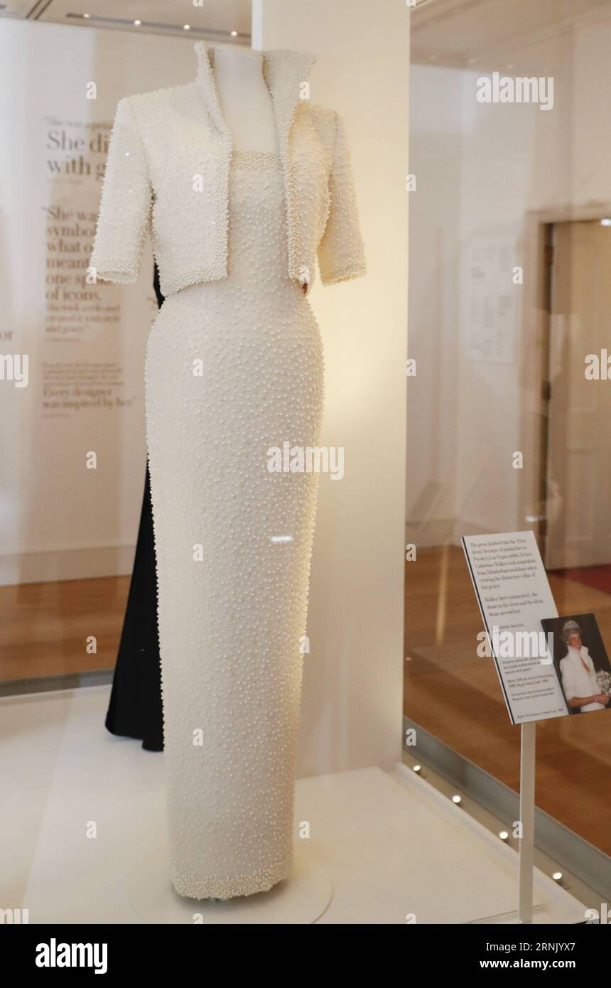 (170222) -- LONDON, Feb. 22, 2017 -- A 1989 Catherine Walker dress and jacket dress embroidered with sequins and pearls, known as the Elvis Dress is pictured at a press preview of Diana: Her Fashion Story Exhibition at the Kensington Palace in London, Britain, on Feb. 22, 2017. The exhibition Diana: Her Fashion Story , which showcases a number of the Princess dresses and outfits, will open to the public on February 24 as part of the events commemorating the life of Princess Diana to mark the 20th anniversary of her death in Paris on August 31, 1997. )(gl) BRITAIN-LONDON-DIANA-EXHIBITION HanxYa Stock Photo