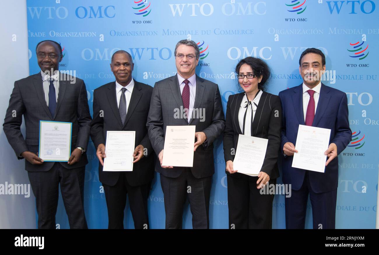 (170222) -- GENEVA, Feb. 22, 2017 -- The World Trade Organization (WTO) Director-General Roberto Azevedo (C) and representatives from Rwanda, Oman, Chad and Jordan show their signed documents in the headquarters of WTO in Geneva, Switzerland, Feb. 22, 2017. Azevedo announced on Wednesday the Trade Facilitation Agreement (TFA) entered into force after two-thirds of members have completed their domestic ratification process. Rwanda, Oman, Chad and Jordan on Wednesday submitted their ratifications of acceptance to Azevedo in WTO s headquarter in Geneva, bringing the total number of ratifications Stock Photo