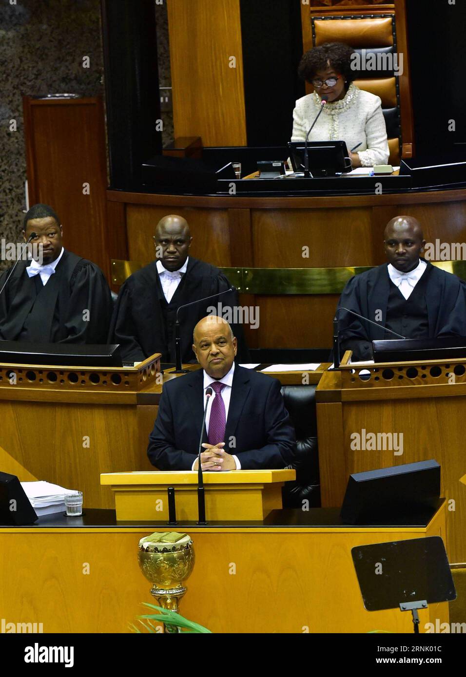 Haushaltssitzung in Südafrika (170222) -- CAPE TOWN, Feb. 22, 2017 -- South?African Finance Minister Pravin Gordhan (front) delivers his 2017 Budget Speech in Parliament in Cape Town, South Africa, on Feb. 22, 2017. Multinational corporations continue to use inconsistencies in global tax rules to their advantage and to avoid tax liabilities, South African Finance Minister Pravin Gordhan said on Wednesday.?) SOUTH AFRICA-CAPE TOWN-BUDGET SPEECH-TAX GCIS/KopanoxTlape PUBLICATIONxNOTxINxCHN   Budget session in South Africa  Cape Town Feb 22 2017 South African Finance Ministers Pravin Gordhan Fron Stock Photo