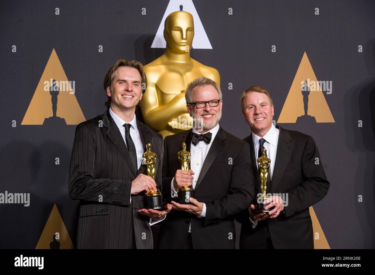 (L-R) Co-directors Byron Howard and Rich Moore and producer Clark Spencer, winners of Best Animated Feature Film Zootopia , pose at press room of the 89th Academy Awards at the Dolby Theater in Los Angeles, the United States, on Feb. 26, 2017. ) (zjy) U.S.-LOS ANGELES-OSCAR-AWARD YangxLei PUBLICATIONxNOTxINxCHN   l r Co Directors Byron Howard and Rich Moore and Producer Clark Spencer winners of Best Animated Feature Film Zootopia Pose AT Press Room of The 89th Academy Awards AT The Dolby Theatre in Los Angeles The United States ON Feb 26 2017 zjy U S Los Angeles Oscar Award YangxLei PUBLICATIO Stock Photo