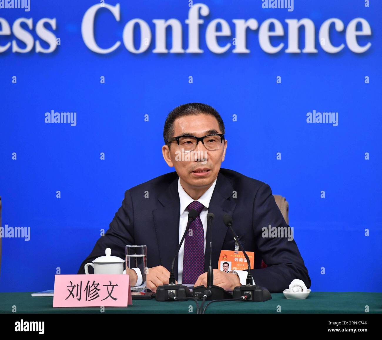 (170310) -- BEIJING, March 10, 2017 -- Liu Xiuwen, deputy director of the Budgetary Affairs Commission of the National People s Congress (NPC) Standing Committee, answers questions on the NPC s supervisory work at a press conference for the fifth session of the 12th NPC in Beijing, capital of China, March 10, 2017. ) (zhs) (TWO SESSIONS)CHINA-BEIJING-NPC-PRESS CONFERENCE-SUPERVISORY WORK (CN) LixXin PUBLICATIONxNOTxINxCHN   Beijing March 10 2017 Liu Xiuwen Deputy Director of The Budgetary Affairs Commission of The National Celebrities S Congress NPC thing Committee Answers Questions ON The NPC Stock Photo