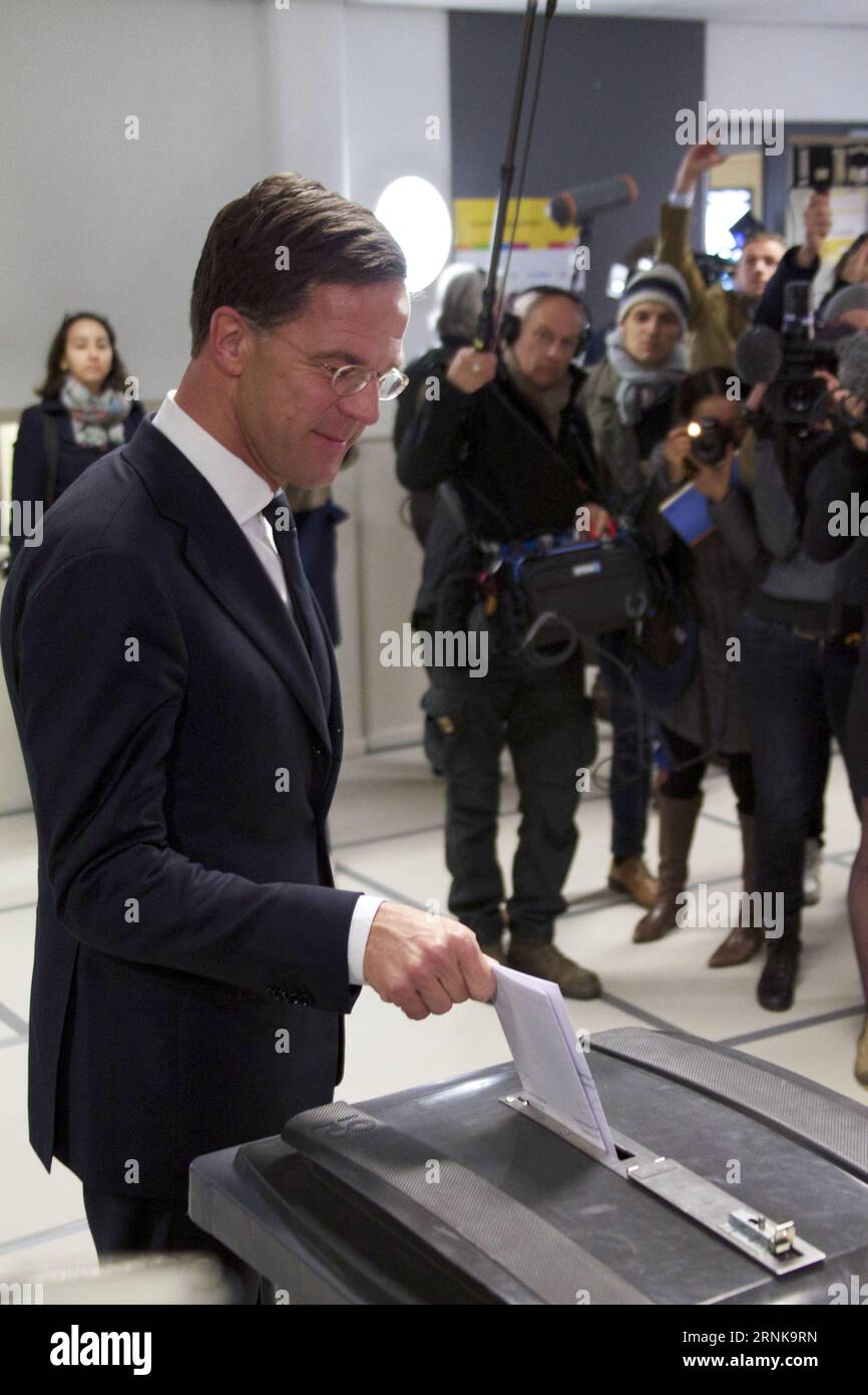 (170315) -- THE HAGUE, March 15, 2017 -- Dutch Prime Minister and People s Party for Freedom and Democracy VVD leader Mark Rutte casts his ballot for the 2017 Dutch parliamentary elections in The Hague, the Netherlands, on March 15, 2017. The liberal rightist party VVD of current Prime Minister Mark Rutte led in the 2017 Dutch parliamentary elections, according to an exit poll released on Wednesday. ) THE NETHERLANDS-THE HAGUE-PARLIAMENTARY ELECTIONS-EXIT POLL-VVD-LEADING SylviaxLederer PUBLICATIONxNOTxINxCHN   The Hague March 15 2017 Dutch Prime Ministers and Celebrities S Party for Freedom a Stock Photo