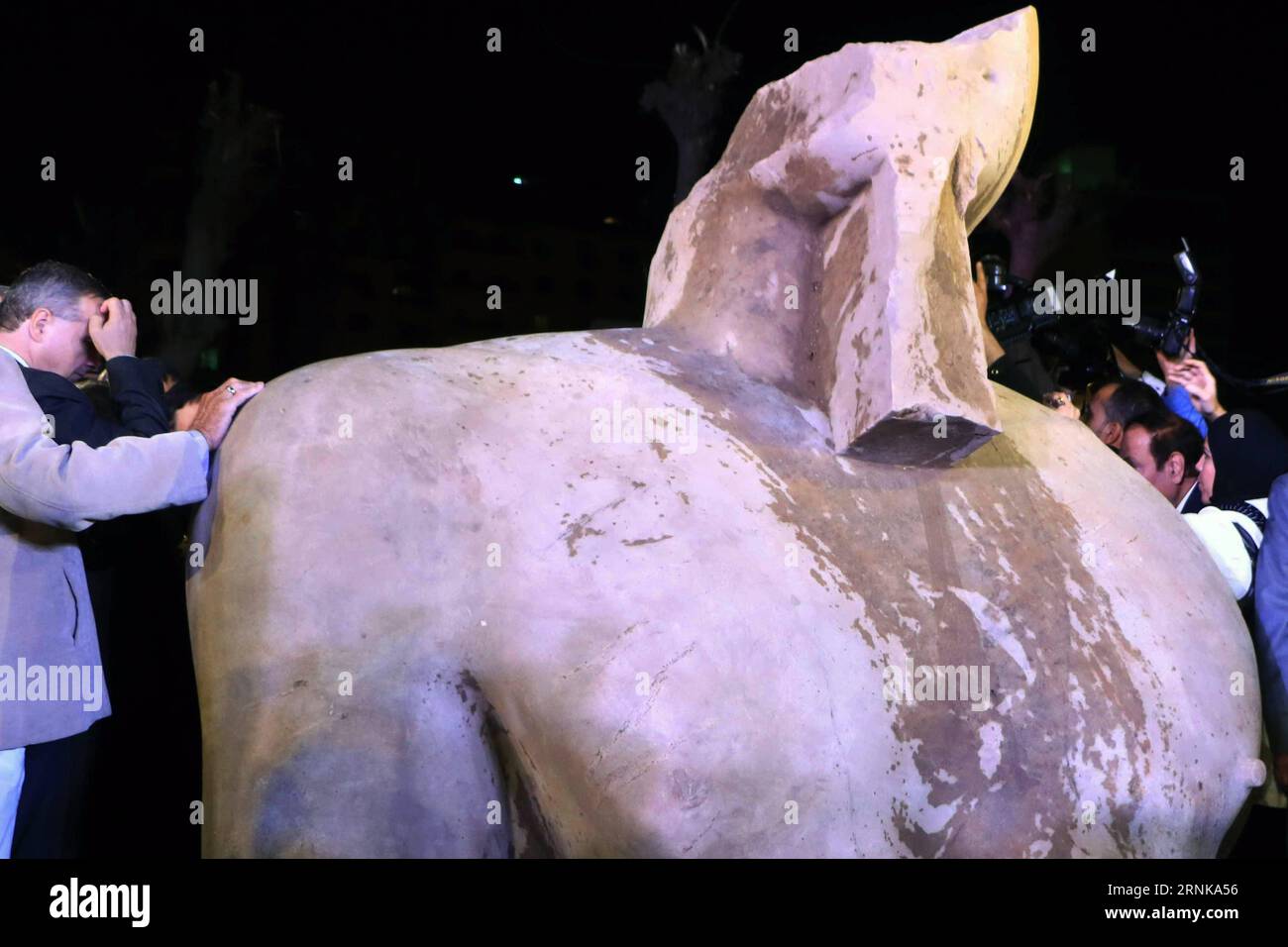 Kairo: Pressetermin zur entdeckten Pharaonenstatue (170316) -- CAIRO, March 16, 2017 -- A royal colossus is seen during a press conference announcing the transfer of its parts to the Egyptian Museum in Cairo, Egypt, on March 16, 2017. Egyptian minister of antiquities Khaled al-Anany said on Thursday that the royal colossus discovered last week at the Cairo district of Matariya is probably a statue of Psammetich I, a pharaoh from the 26th dynasty who ruled Egypt between 664 and 610 B.C., rather than King Ramses II as believed earlier, according to state-run Ahram Online. ) EGYPT-CAIRO-ARCHEOLOG Stock Photo