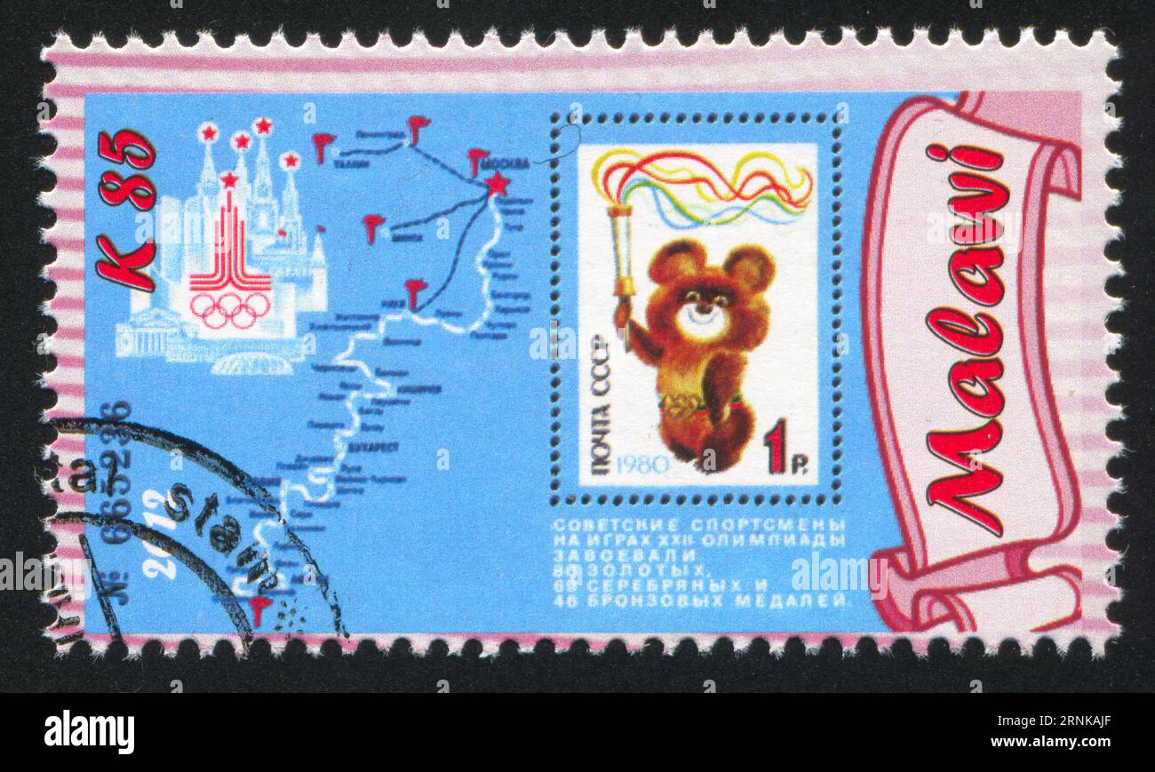 MALAWI - CIRCA 2012: stamp printed by Malawi, shows Olympic mascot Misha, circa 2012 Stock Photo