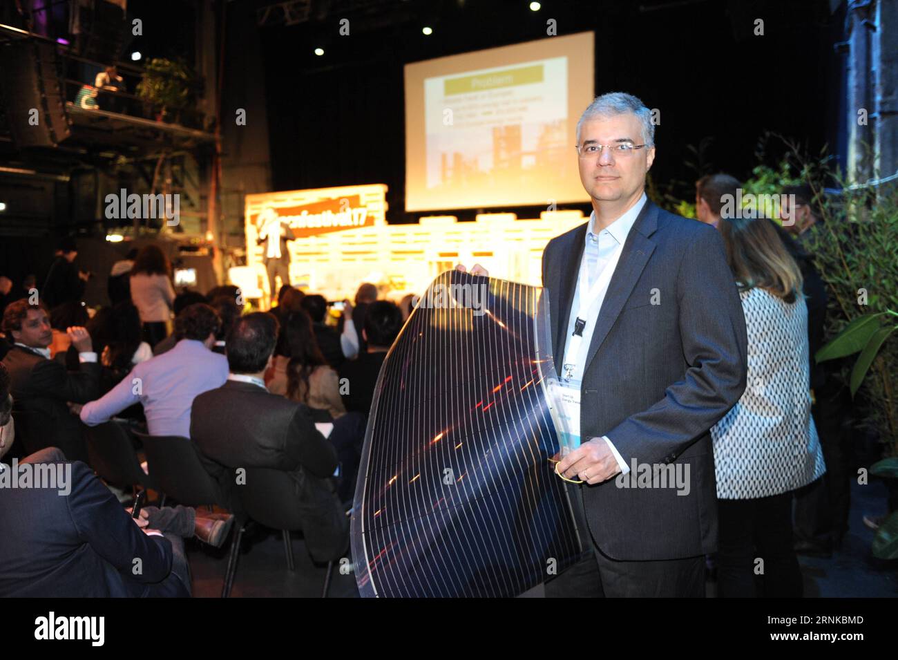 (170321) -- BERLIN, March 21, 2017 -- A finalist from Brazil shows a light-weight and cost-effecitve solar panel developed by his start-up enterprise during the first Start up Energy Transition Tech Festival, organized by the German Energy Agency (DENA) in Berlin, Germany, on March 20, 2017. ) (zjy) GERMANY-BERLIN-START UP ENERGY TRANSITION AWARD YanxFeng PUBLICATIONxNOTxINxCHN   Berlin March 21 2017 a Finalist from Brazil Shows a Light Weight and Cost  Solar Panel Developed by His Start up Enterprise during The First Start up Energy TRANSITION Tech Festival Organized by The German Energy Agen Stock Photo