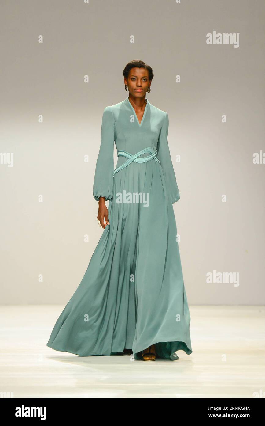 170330) -- JOHANNESBURG, March 30, 2017 -- A model presents a creation by  designer Chu Yan during South?African Fashion Week Spring Summer 2017 at  Hyde Park Corner in Johannesburg,?South?Africa, on March 30,
