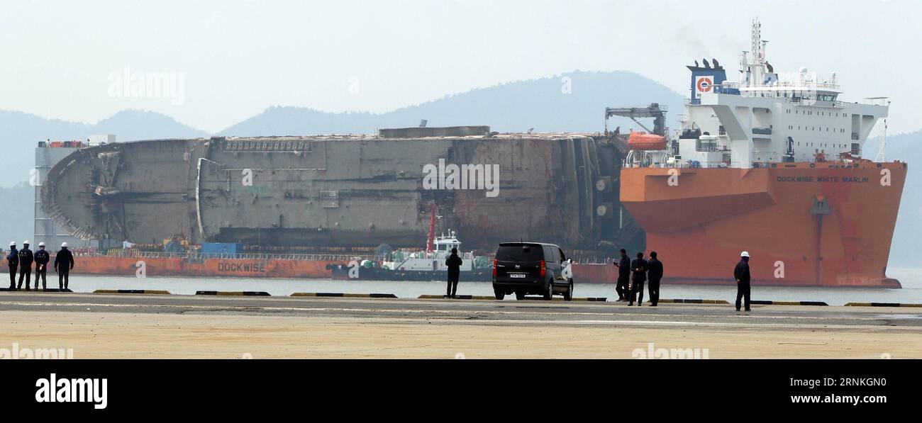 (170331) -- MOKPO, March 31, 2017 -- The remains of sunken South Korean passenger ferry Sewol arrives at a port in Mokpo, some 90 km away from the Jindo Island, South Korea, March 31, 2017. The 6,825-ton passenger ferry Sewol capsized and sank in waters off Jindo Island on April 16, 2014. It claimed the lives of 304 people, mostly high school students on a school trip. )(gj) SOUTH KOREA-MOKPO-SEWOL FERRY YaoxQilin PUBLICATIONxNOTxINxCHN   Mokpo March 31 2017 The Remains of Sunken South Korean Passenger Ferry Sewol arrives AT a Port in Mokpo Some 90 km Away from The JINDO Iceland South Korea Ma Stock Photo