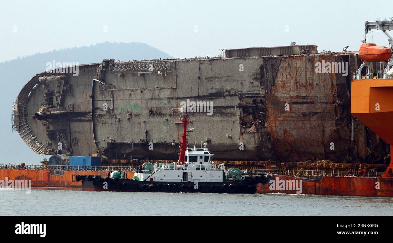 (170331) -- MOKPO, March 31, 2017 -- The remains of sunken South Korean passenger ferry Sewol arrives at a port in Mokpo, some 90 km away from the Jindo Island, South Korea, March 31, 2017. The 6,825-ton passenger ferry Sewol capsized and sank in waters off Jindo Island on April 16, 2014. It claimed the lives of 304 people, mostly high school students on a school trip. )(gj) SOUTH KOREA-MOKPO-SEWOL FERRY YaoxQilin PUBLICATIONxNOTxINxCHN   Mokpo March 31 2017 The Remains of Sunken South Korean Passenger Ferry Sewol arrives AT a Port in Mokpo Some 90 km Away from The JINDO Iceland South Korea Ma Stock Photo