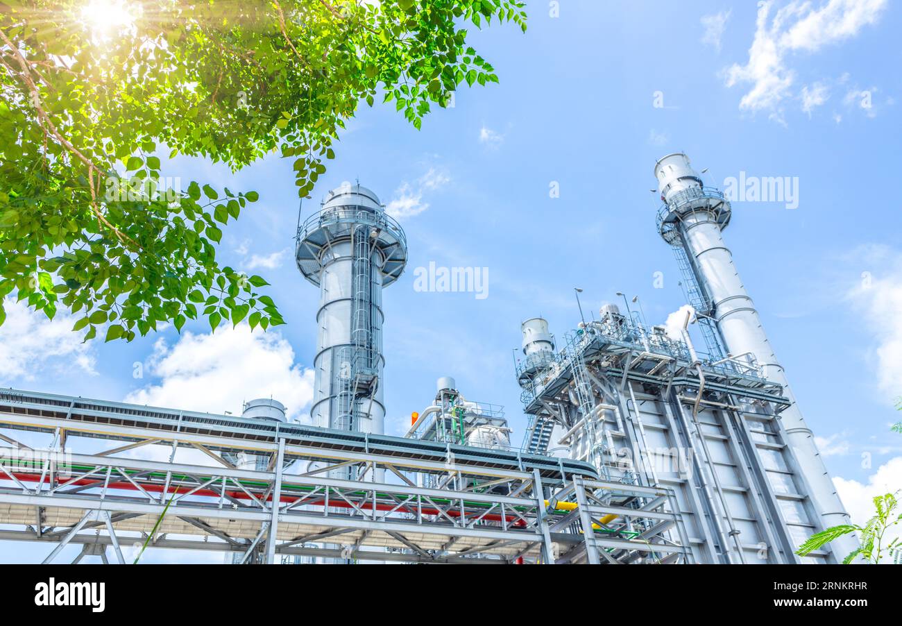 power plant with tree. green industry eco power for sustainable energy saving environmental friendly low carbon footprint. Stock Photo