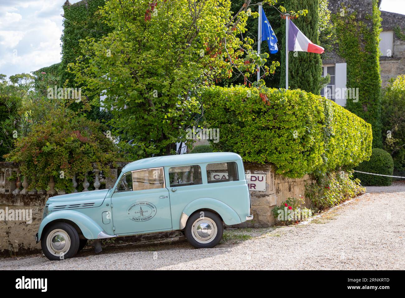 saint-emilion , France -  08 19 2023 : Renault juva 4 advertising wine castle car in side view outdoor blue vintage retro french vehicle for chateau l Stock Photo
