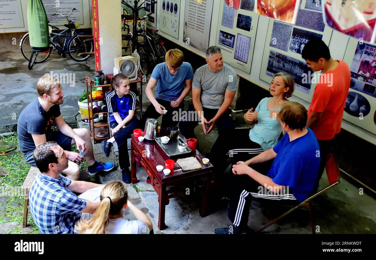 (170421) -- YONGCHUN, April 21, 2017 -- Niewerth Luise, her family members and other Kung Fu fans gather at Wenggongci martial art club in Yongchun, southeast China s Fujian Province, April 20, 2017. Influenced by the movie Kung Fu Panda, eleven-year-old German girl Niewerth Luise started to learn Kung Fu from her father since 2015. She was attracted by the White Crane Style, a Chinese martial art originated in Yongchun of China s Fujian Province, which was practiced by actor Bruce Lee. In April 2017, Niewerth came with her family and serval German Kung Fu fans to Yongchun to learn the White C Stock Photo