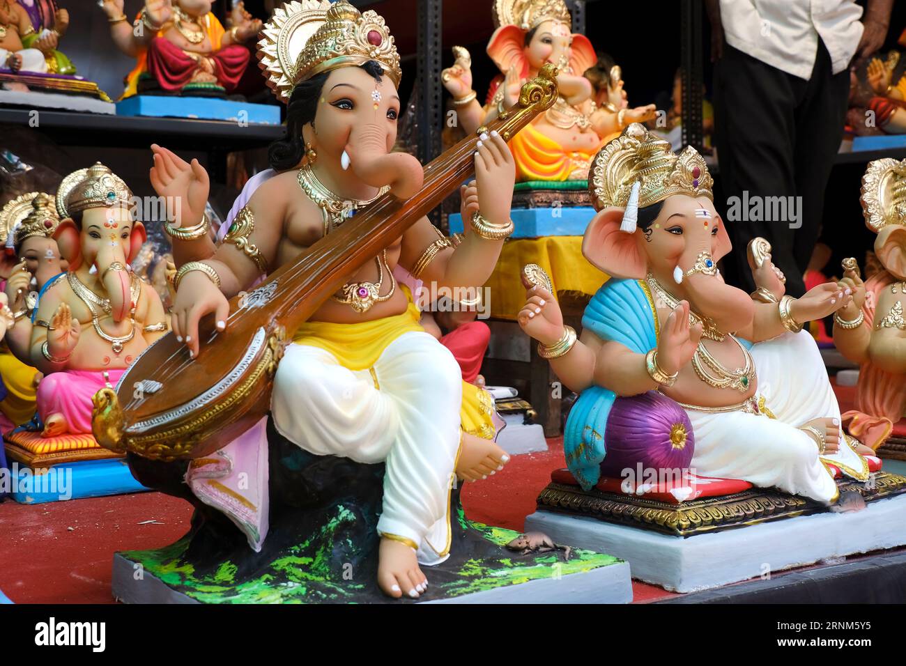 31 August 2023, Pune, India, Newly made idols of the God known as Ganesha or Ganapati for sale