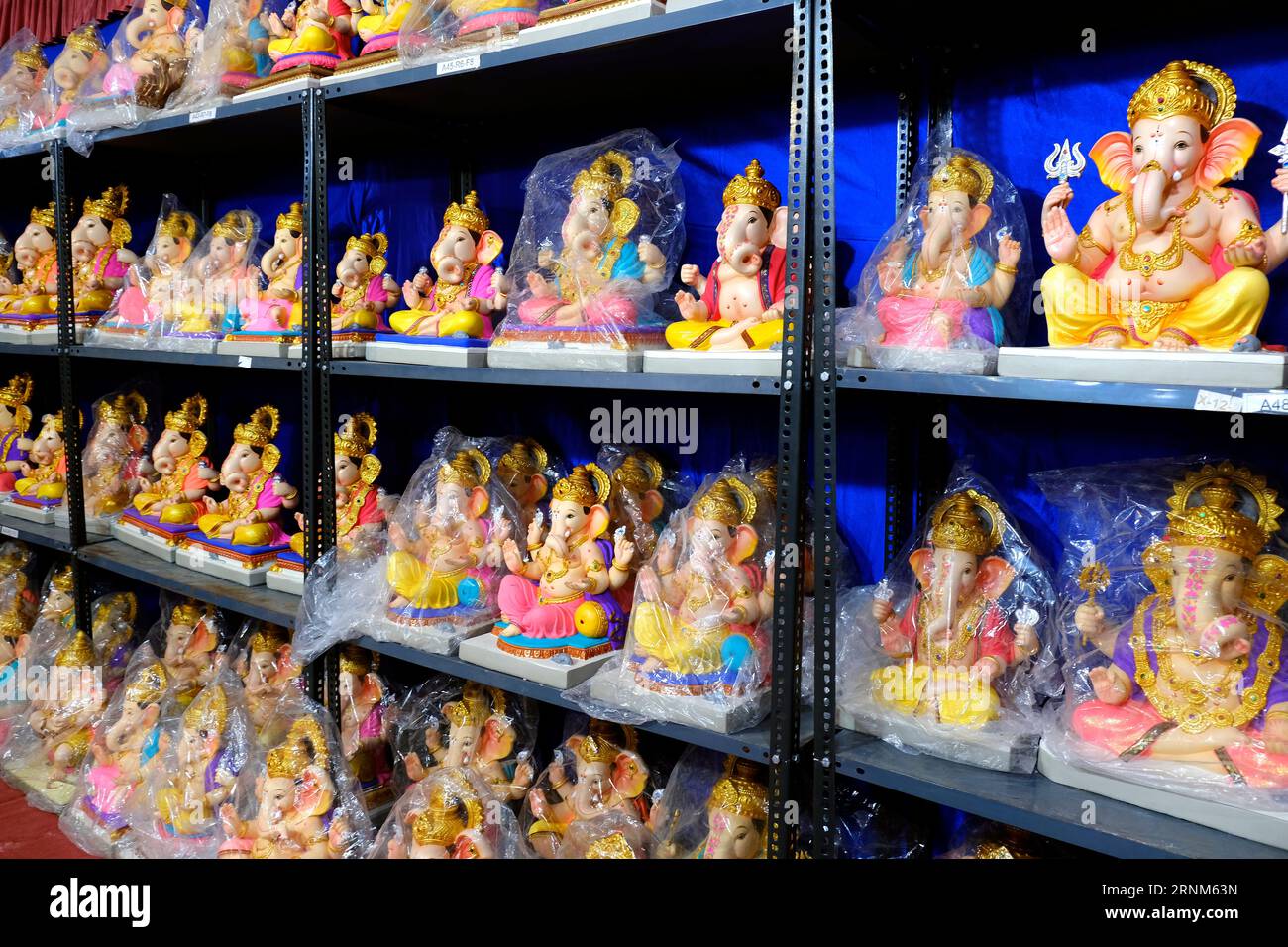 31 August 2023, Pune, India, Newly made idols of the God known as Ganesha or Ganapati for sale
