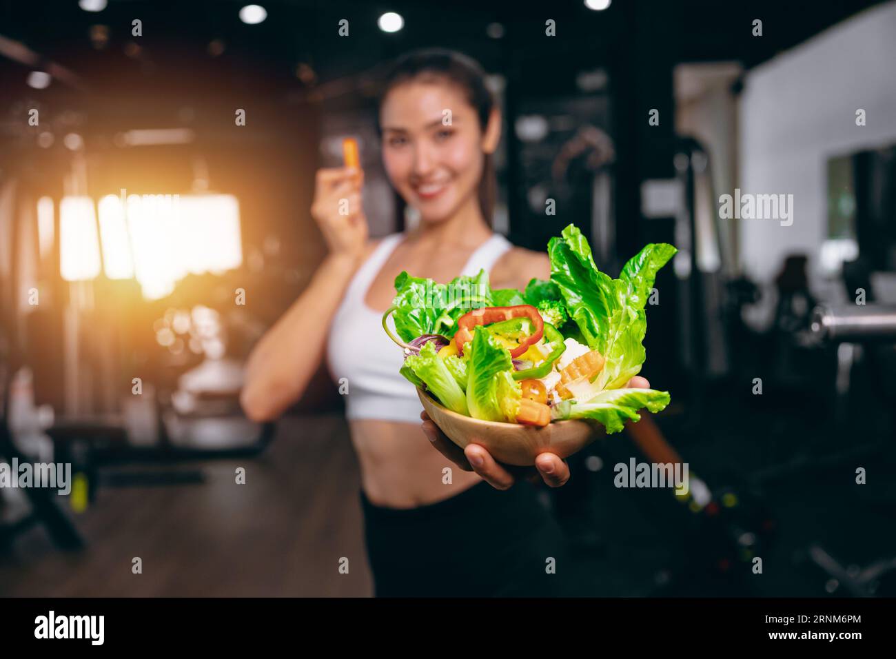 sport healthcare woman show mix vegetable bowl for healthy eating and dieting lifestyle concept Stock Photo