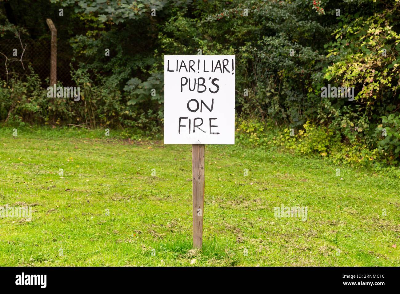 Himley, Staffordshire, UK. 2nd Sep, 2023. Four weeks after the famous Crooked House pub burned down, protest signs and the Black Country's flag are displayed in support of re-building the landmark building in the same location. A sign reads Liar! Liar! Pub's on Fire. Credit: Peter Lopeman/Alamy Live News Stock Photo