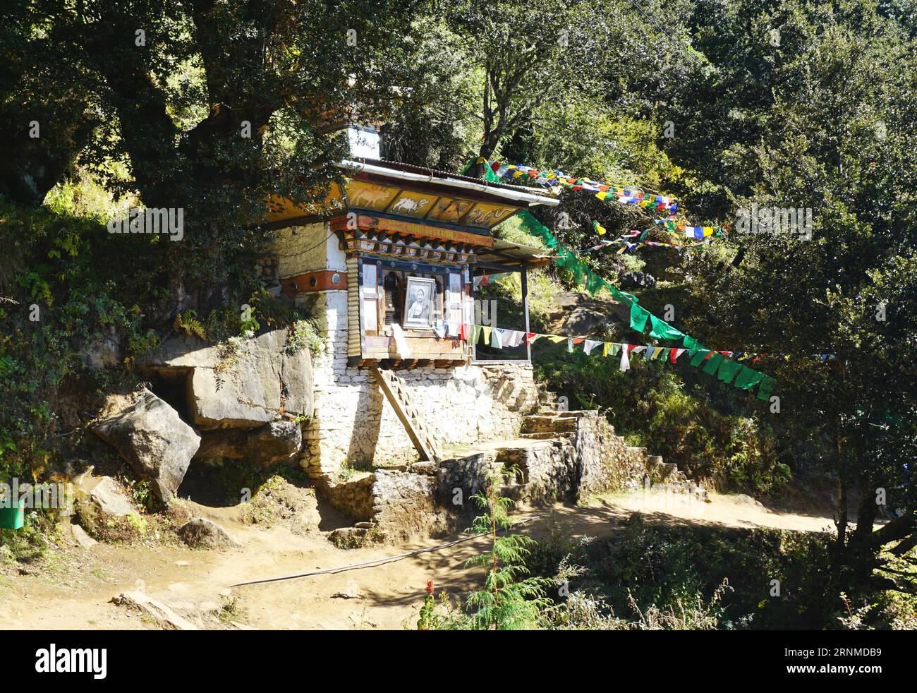 Small temple at the birthplace of Geshey Guenden Rinchen on the footpath to Tiger’s Nest Monastery, Paro, Bhutan. Rinchen was Bhutan’s 69th Je Khenpo Stock Photo