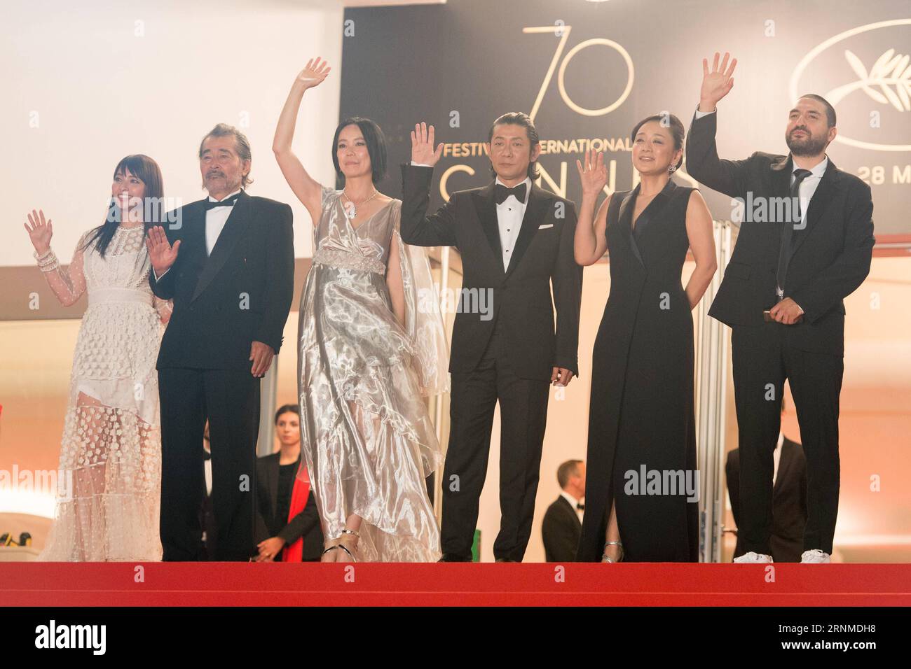 (170524) -- CANNES, May 24, 2017 -- Actress Ayame Misaki, actor Tatsuya Fuji, Director Naomi Kawase, actor Masatoshi Nagase, actress Misuzu Kanno and composer Ibrahim Maalouf (L-R), pose on the red carpet for the screening of the film Radiance in competition at the 70th Cannes Film Festival in Cannes, France, May 23, 2017. ) (jmmn) FRANCE-CANNES-70TH CANNES FILM FESTIVAL-IN COMPETITION-RADIANCE-RED CARPET ChenxYichen PUBLICATIONxNOTxINxCHN   Cannes May 24 2017 actress Ayame Misaki Actor Tatsuya Fuji Director Naomi Kawase Actor Masatoshi NAGASE actress  Kanno and Composer Ibrahim Maalouf l r Po Stock Photo