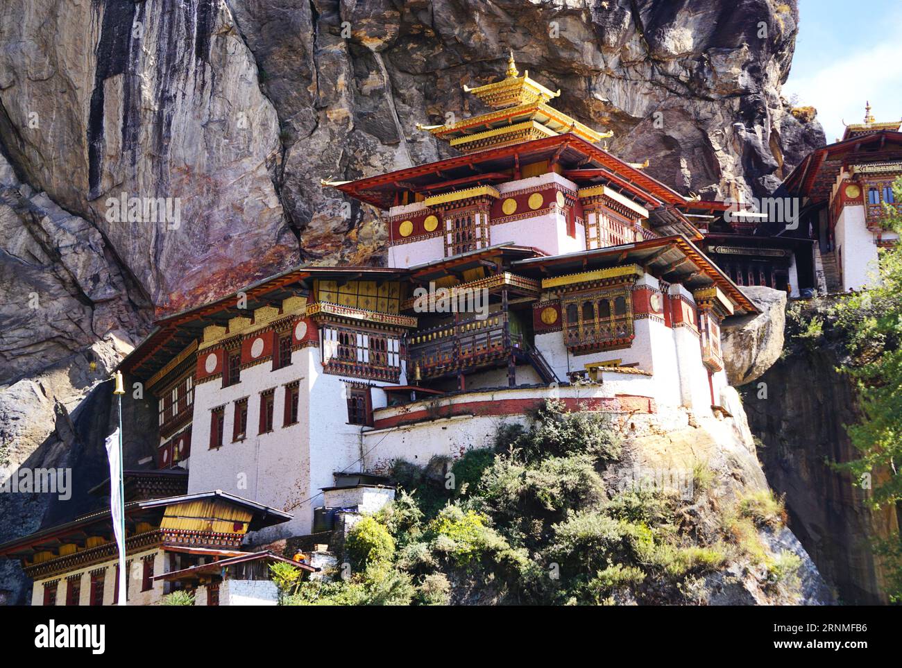 Closeup of the main structure at Bhutan's famous Tiger's Nest Monastery (Taktsang), nestled among the sheer cliffs high above the Paro Valley Stock Photo