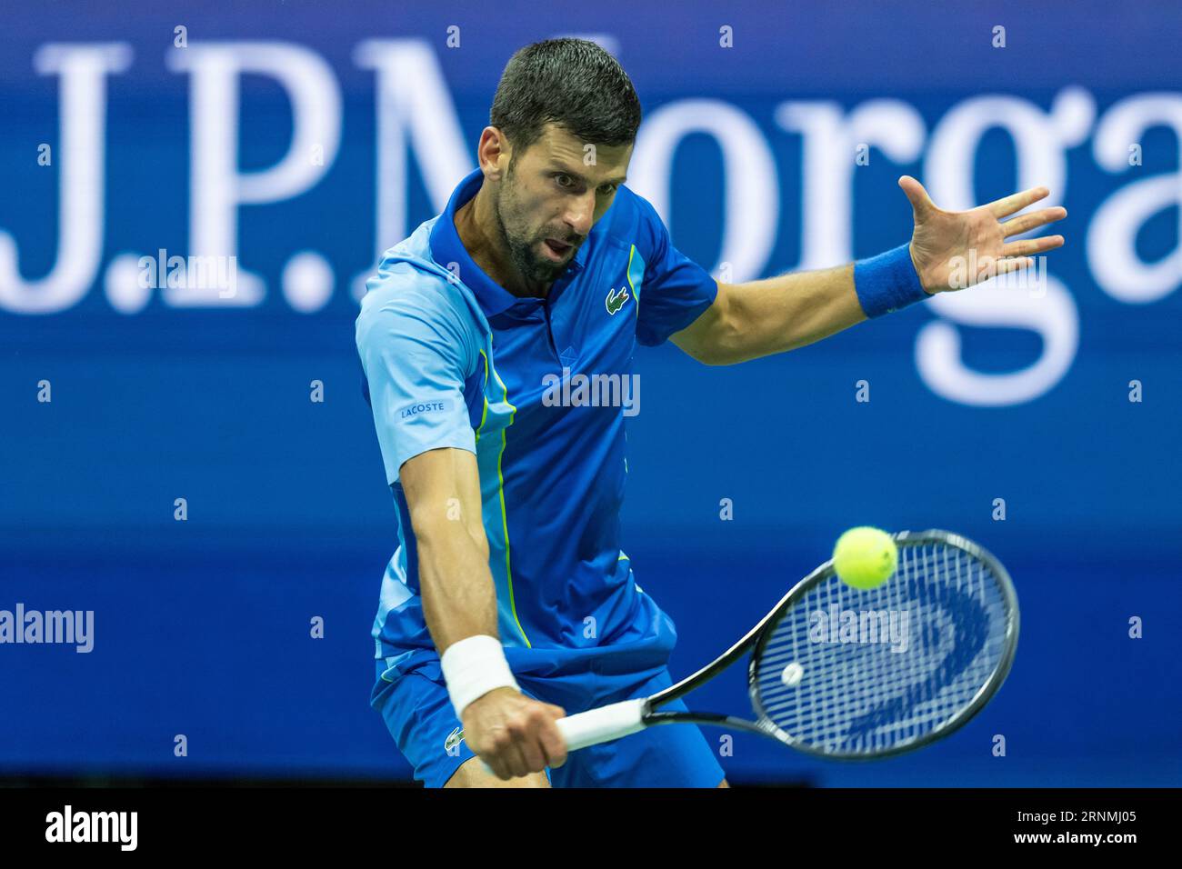 Novak Djokovic of Serbia returns ball during 3rd round against