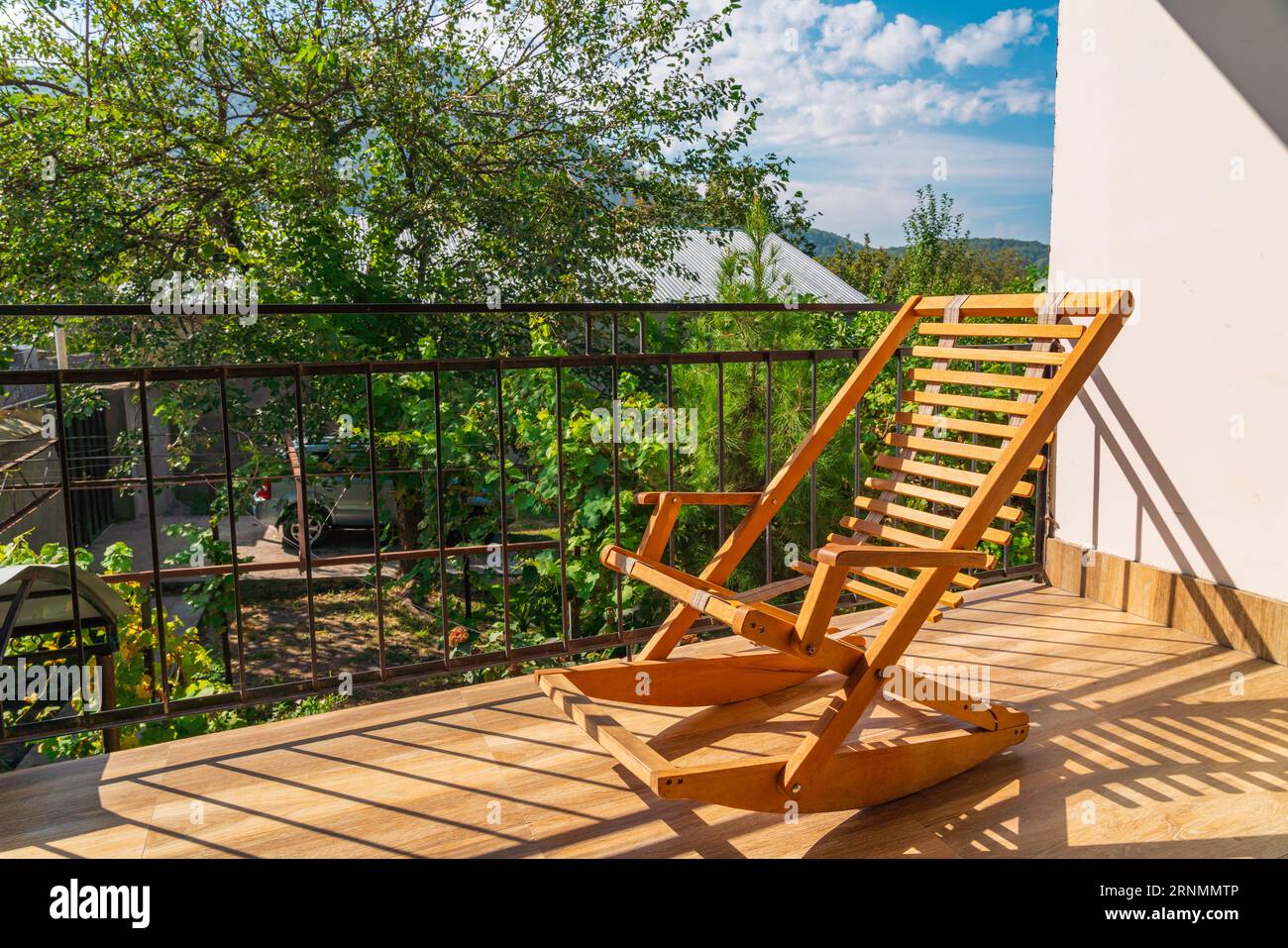 Rocking chair outside hi-res stock photography and images - Alamy