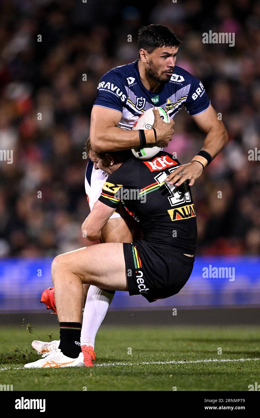 Sydney, Australia. 02nd Sep, 2023. Jordan McLean of the Cowboys is tackled  by Zac Hosking of the Panthers during the Round 27 NRL match between the  Penrith Panthers and the North Queensland