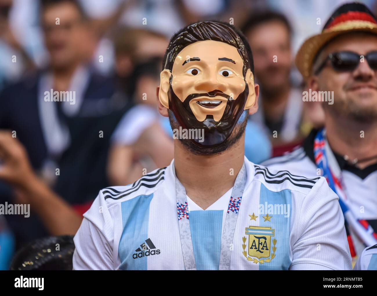 Moscow, Russia - June 16, 2018. Fan from Argentina wearing Lionel Messi mask during FIFA World Cup 2018 match Argentina vs Iceland (1-1). Stock Photo