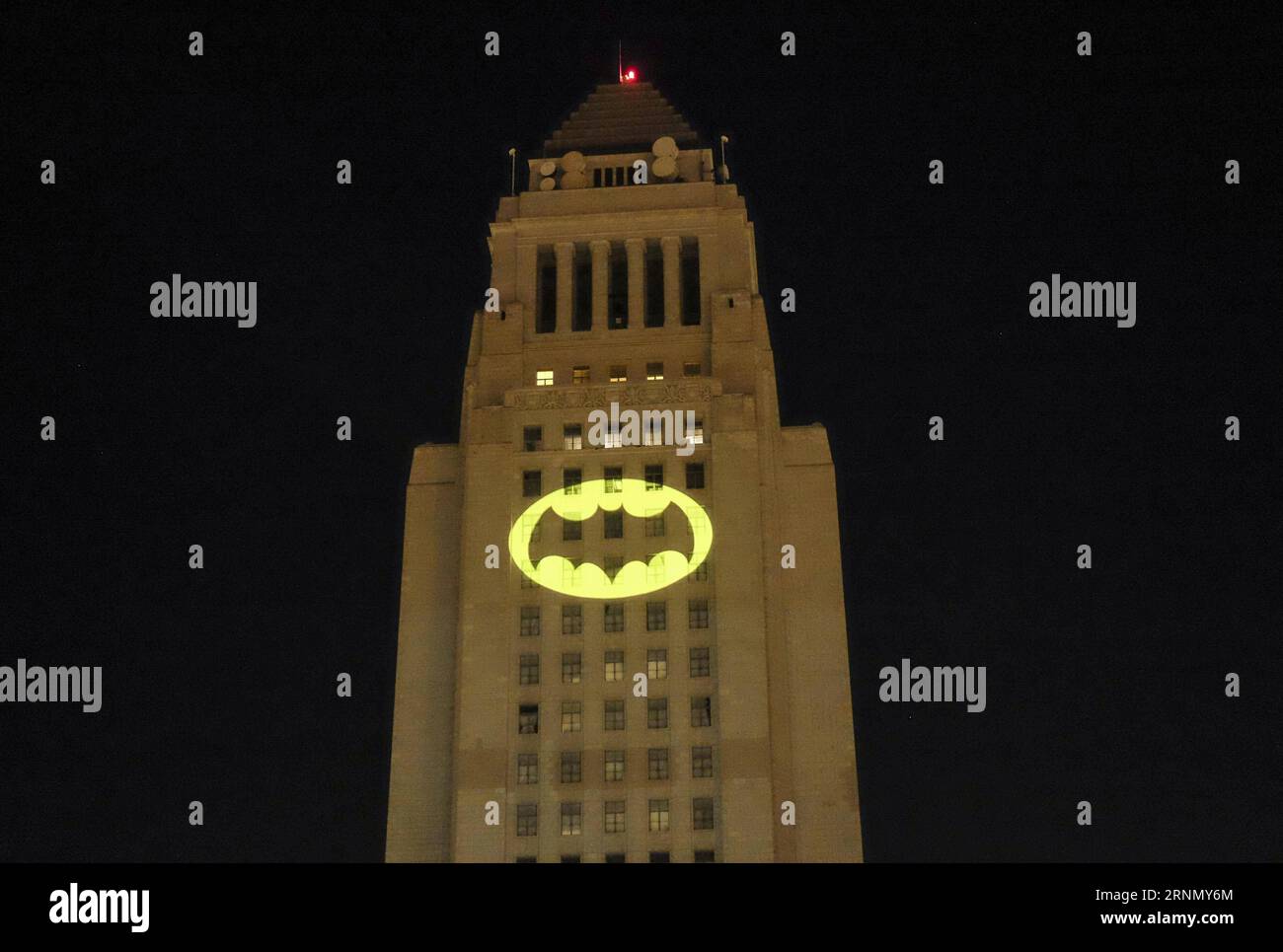 (170616) -- LOS ANGELES, June 16, 2017 -- The Bat-signal is projected onto Los Angles City Hall during a tribute of Batman actor Adam West in Los Angeles, the United States, June 15, 2017. Adam West, the American actor best known as the star of the 1966-1968 ABC series Batman, has died at 88. ) (zxj) U.S.-LOS ANGELES-BATMAN-COMMEMORATION ZhaoxHanrong PUBLICATIONxNOTxINxCHN   170616 Los Angeles June 16 2017 The Bat Signal IS projected onto Los Angles City Hall during a Tribute of Batman Actor Adam WEST in Los Angeles The United States June 15 2017 Adam WEST The American Actor Best known As The Stock Photo