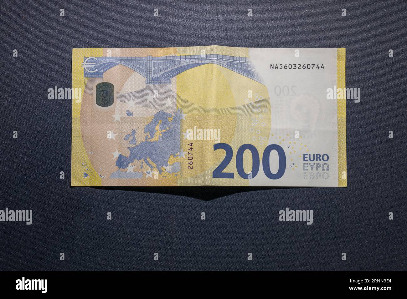 200 euro banknote on the black background Stock Photo - Alamy