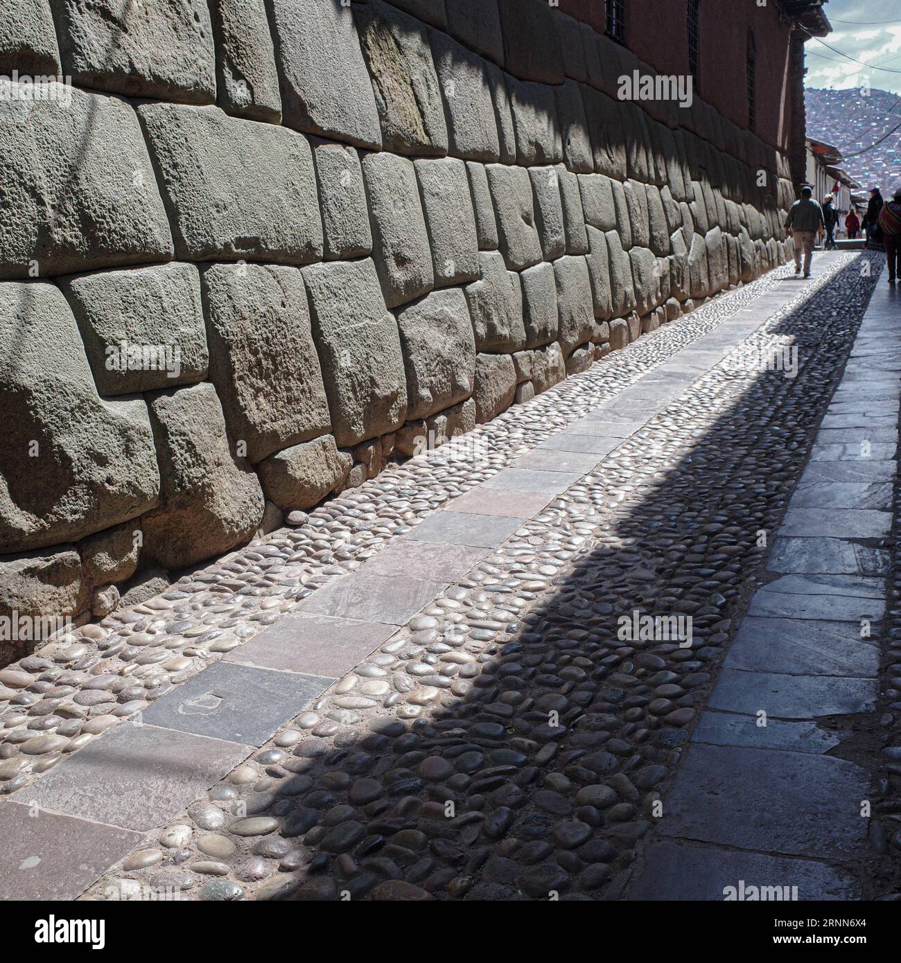 Cusco, Peru - Dec 5, 2022: Hatun Rumiyoc street with Incan twelve angle stone in Cusco, Peru Stock Photo