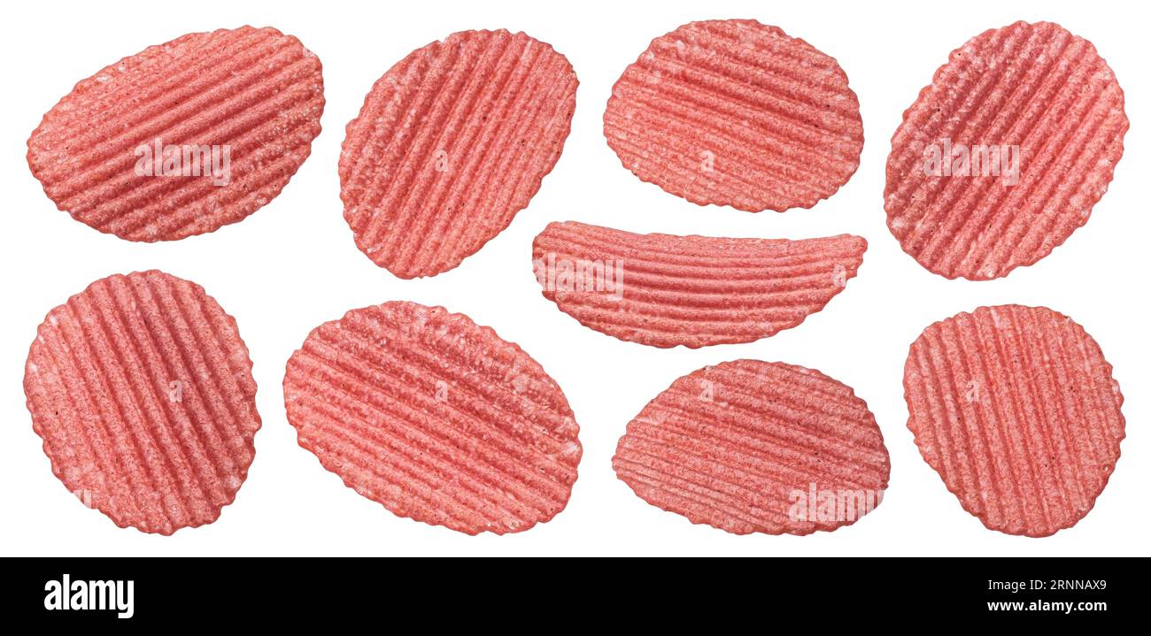 Falling red ridged beetroot chips isolated on white background Stock Photo