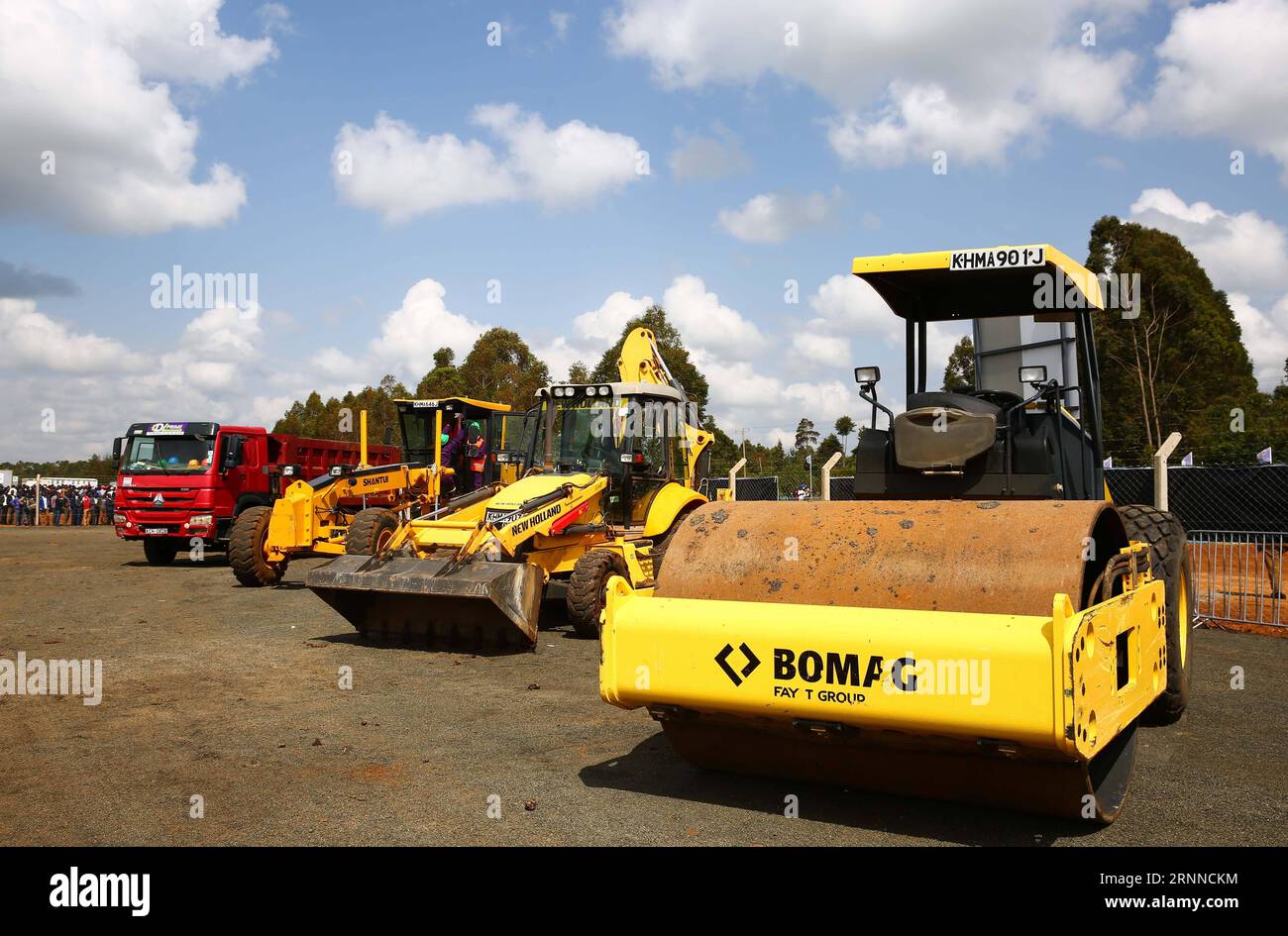 (170707) -- ELDORET(KENYA), July 7, 2017 -- Construction vehicles are seen at the launching ceremony of the Special Economic Zone project in Eldoret, Kenya, on July 7, 2017. Kenya on Friday launched a Special Economic Zone (SEZ) project that is expected to attract about 2 billion U.S. dollars of foreign investments. The project is a joint venture between Kenyan-based company Africa Economic Zone and China s Guangdong New South Group. ) KENYA-ELDORET-SPECIAL ECONOMIC ZONE-LAUNCHING CEREMONY PanxSiwei PUBLICATIONxNOTxINxCHN   Eldoret Kenya July 7 2017 Construction VEHICLES are Lakes AT The Launc Stock Photo