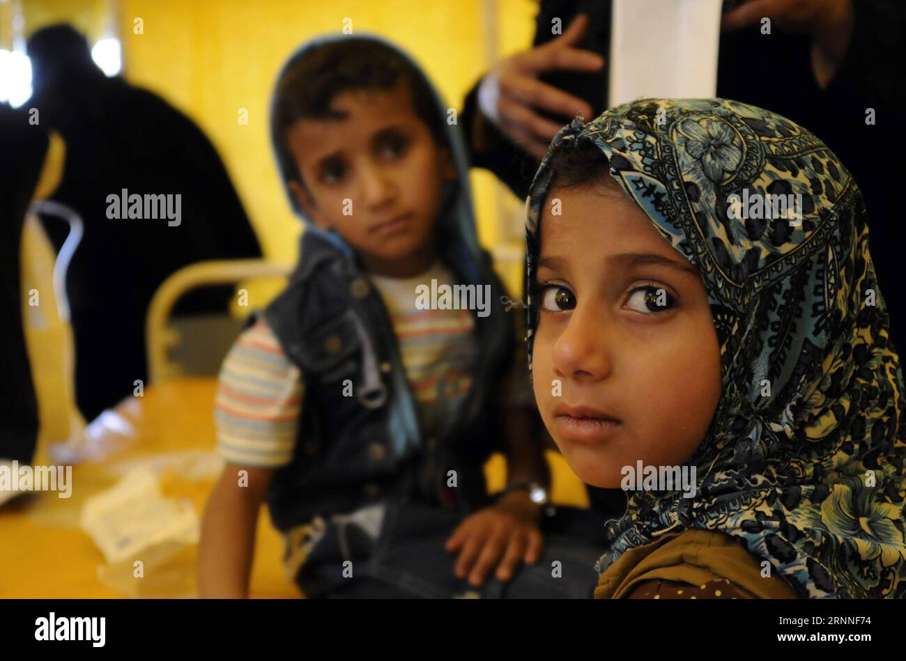 (170711) -- SANAA, July 11, 2017 -- A cholera-infected girl stands by her brother as they receive medical treatment at a hospital in Sanaa, Yemen, on July 11, 2017. Cholera disease has infected more than 300,000 people in war-torn Yemen since late April, the international Committee of the Red Cross (ICRC) said on Monday. ) YEMEN-SANAA-CHOLERA-OVER 300,000 PEOPLE MohammedxMohammed PUBLICATIONxNOTxINxCHN   Sanaa July 11 2017 a Cholera infected Girl stands by her Brother As They receive Medical Treatment AT a Hospital in Sanaa Yemen ON July 11 2017 Cholera Disease has infected More than 300 000 C Stock Photo