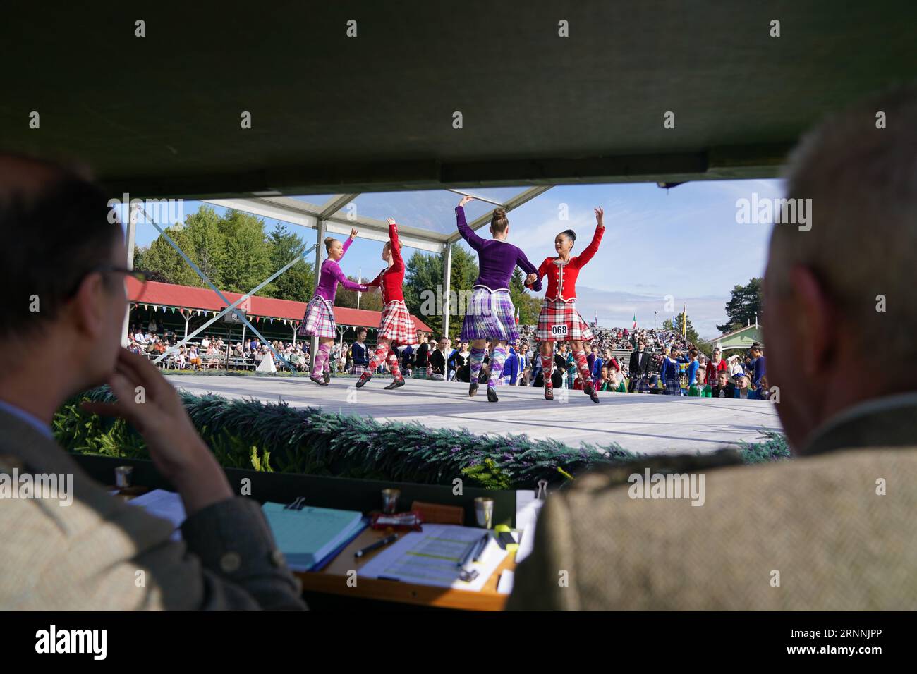 Judges watch Highland dancers during the Braemar Gathering highland games held a short distance from the royals' summer retreat at the Balmoral estate in Aberdeenshire. Picture date: Saturday September 2, 2023. Stock Photo