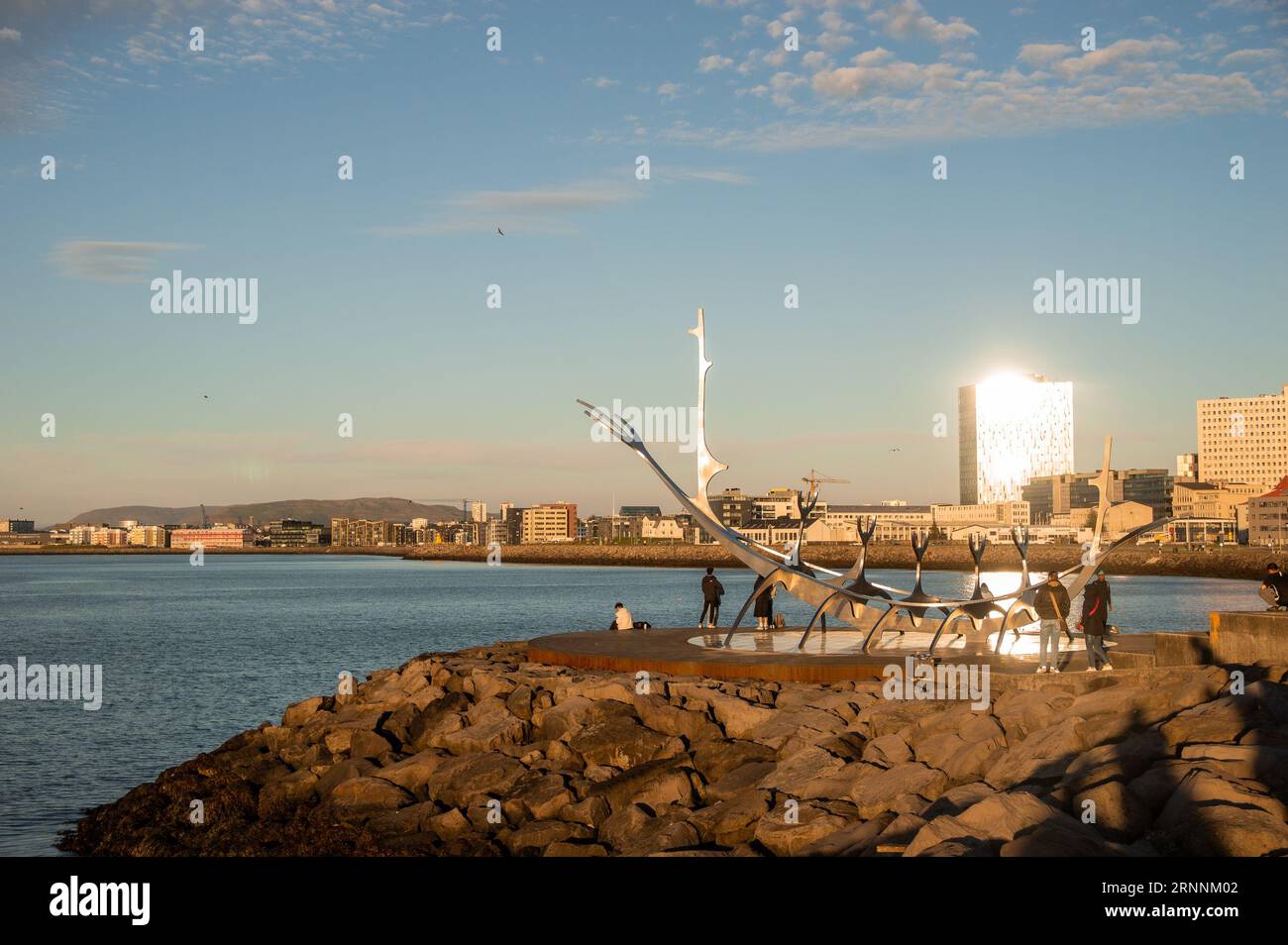 Reykjavik city skyline with sunset over the harbor