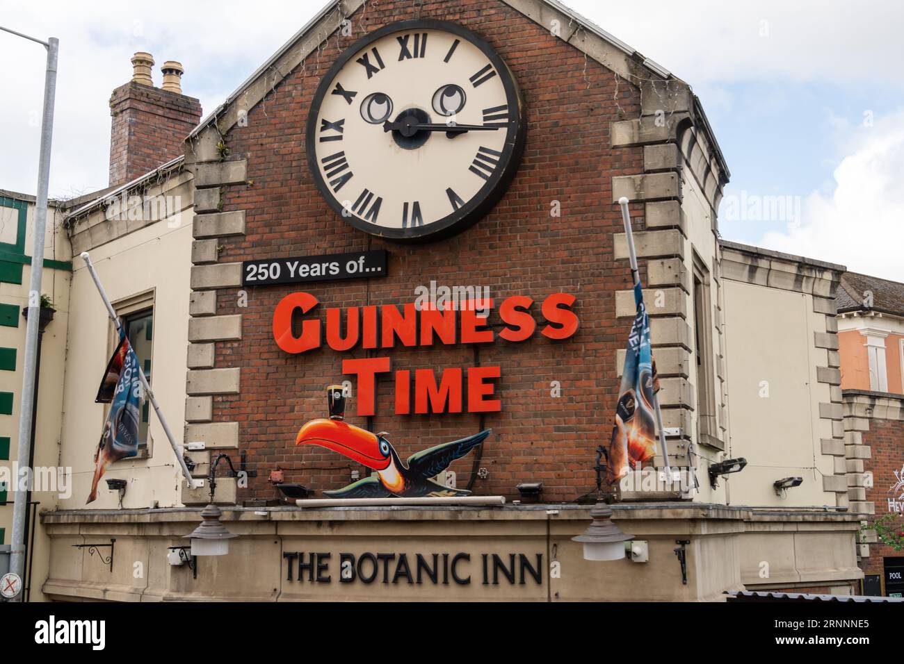 Guinness Time clock on the frontage of The Botanic Inn in the city 