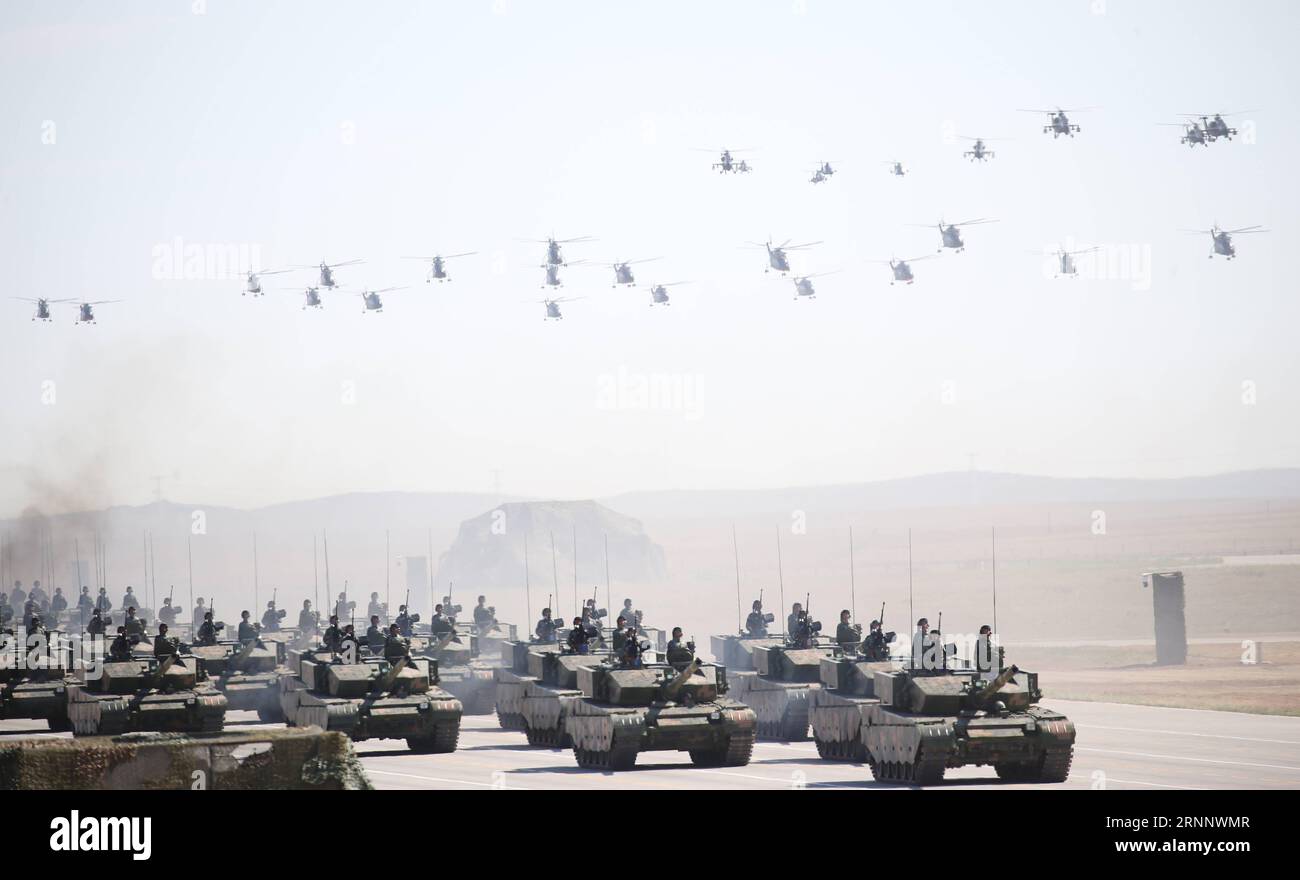 (170730) -- ZHURIHE, July 30, 2017 -- Photo taken on July 30, 2017 shows the echelon of airborne elite troops and a tanks formation during a military parade at Zhurihe training base in north China s Inner Mongolia Autonomous Region. China on Sunday held a grand military parade to mark the 90th founding anniversary of the People s Liberation Army. )(wsw) (PLA 90)CHINA-INNER MONGOLIA-ZHURIHE-MILITARY PARADE (CN) YaoxDawei PUBLICATIONxNOTxINxCHN   Zhurihe July 30 2017 Photo Taken ON July 30 2017 Shows The Echelon of Airborne Elite Troops and a Tanks Formation during a Military Parade AT Zhurihe T Stock Photo