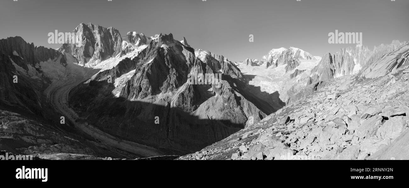 The panorama of Grand Jorasses Mont Blanc massif and Les Aiguilles towers. Stock Photo