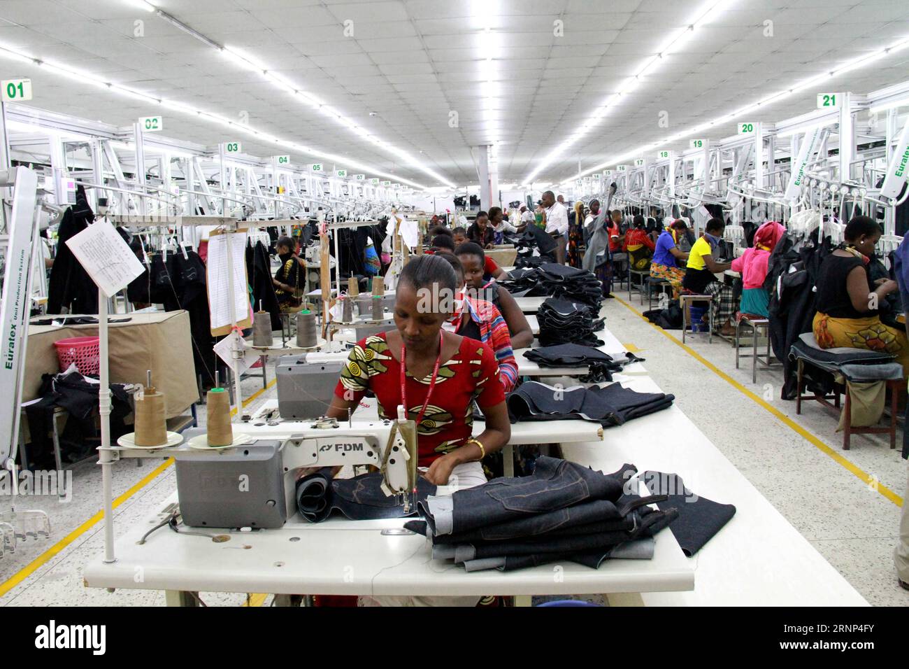 (170810) -- DAR ES SALAAM, Aug. 10, 2017 -- Photo taken on Aug. 7 shows local people working in Chinese-invested Tooku Garments Company Limited in Benjamin Mkapa Export Processing Zone in Dar es Salaam, Tanzania. Some 2,700 Tanzanians are employed by the Chinese garments manufacturing firm which started operations in February 2012 by building a sewing and washing factory with sewage treatment, a generator and other infrastructure. ) TANZANIA-DAR ES SALAAM-CHINESE FIRM LixSibo PUBLICATIONxNOTxINxCHN   dar it Salaam Aug 10 2017 Photo Taken ON Aug 7 Shows Local Celebrities Working in Chinese Inve Stock Photo