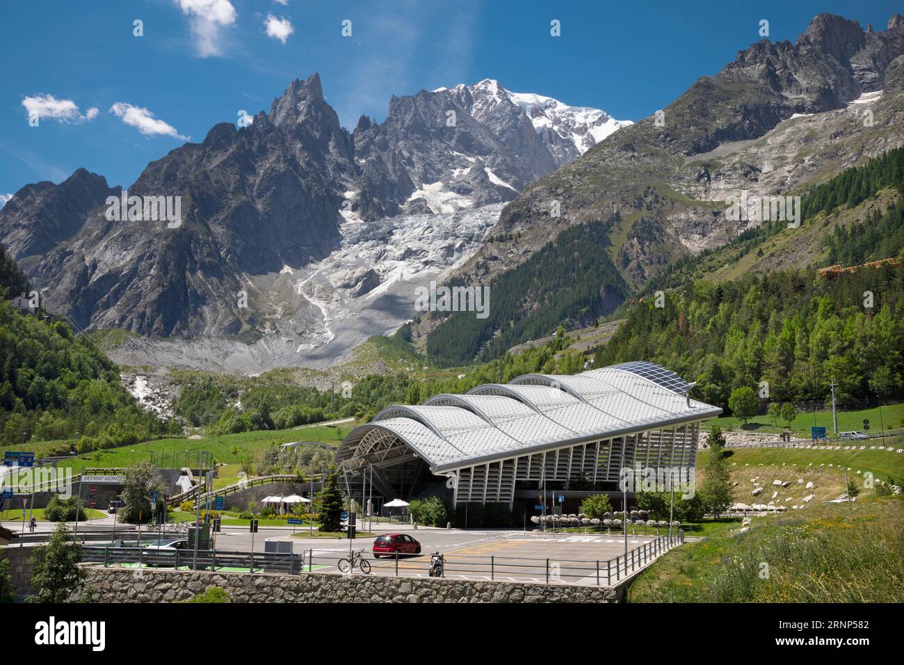 The Mont Blanc Massif with the Brenva glacier and statioin of Vallee Blanche Cable Car over the Entreves - Italy. Stock Photo