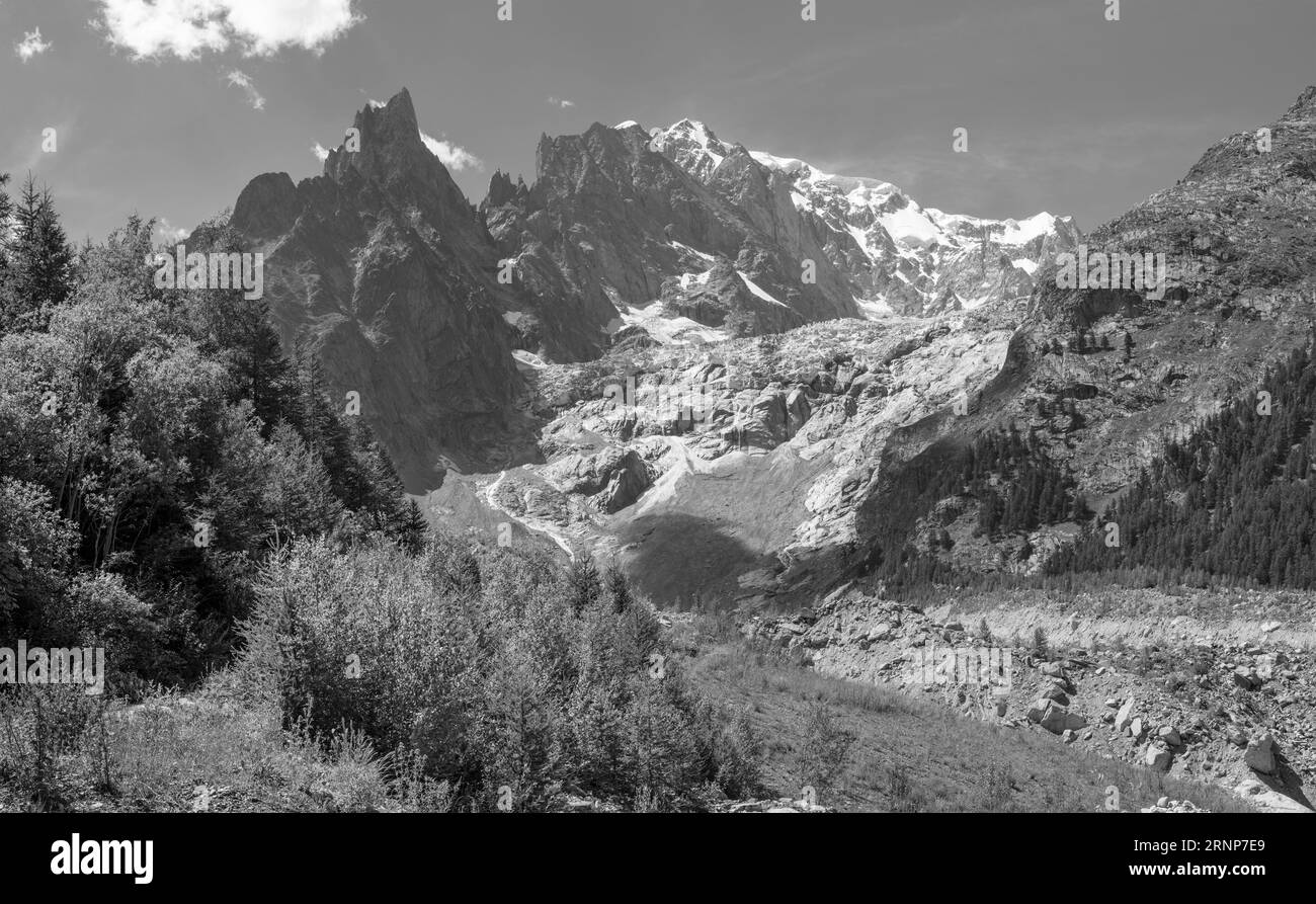The  Mont Blanc massif and Brenva glacier from Val Ferret valley - Entreves in Italy. Stock Photo