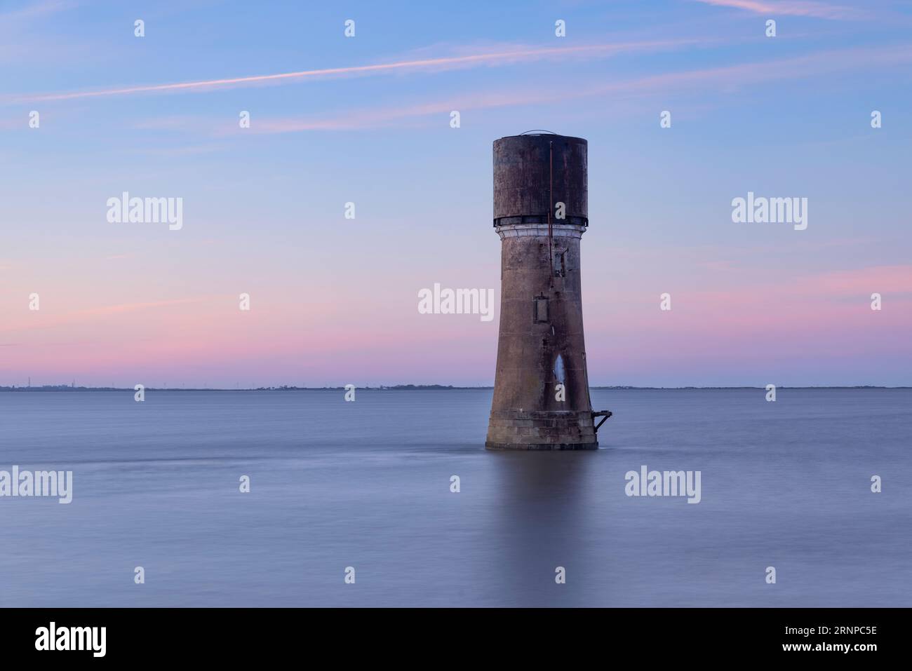 The decommissioned lighthouse in the mouth of the Humber estuary at Spurn Point, Humberside, East Yorkshire, UK Stock Photo