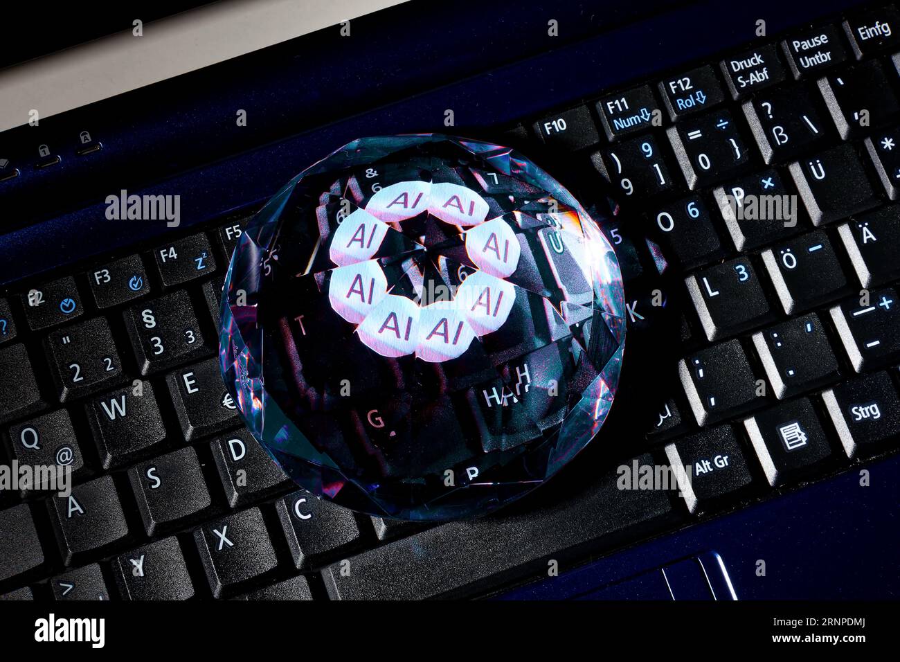 AI, artificial intelligence the new diamond of information technology, colorful image with closeup of laptop and diamond Stock Photo