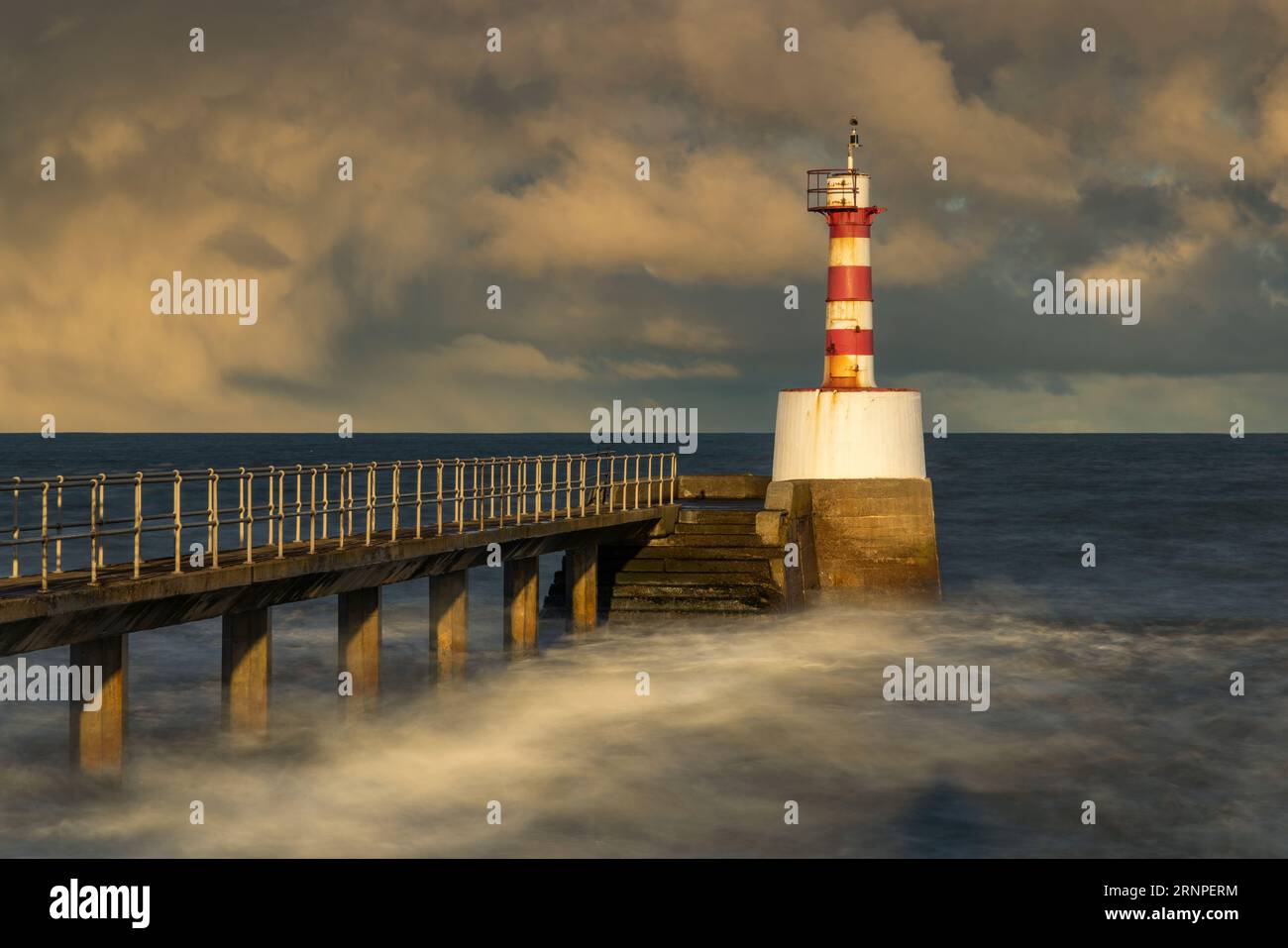 South Jetty lighthouse, Amble, Northumberland, UK Stock Photo