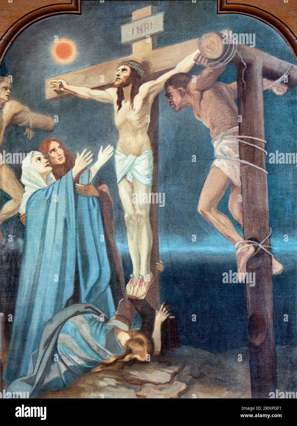 SEBECHLEBY, SLOVAKIA - OKTOBERT 8, 2022: The painting Crucifixion as part of Cross way stations in St. Michael parish church by unkonwn artist Stock Photo